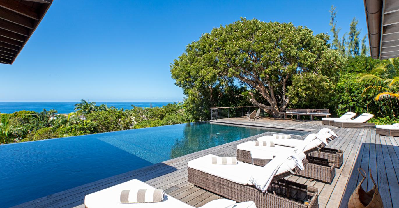 Sundeck House Sun Loungers and Pool with View