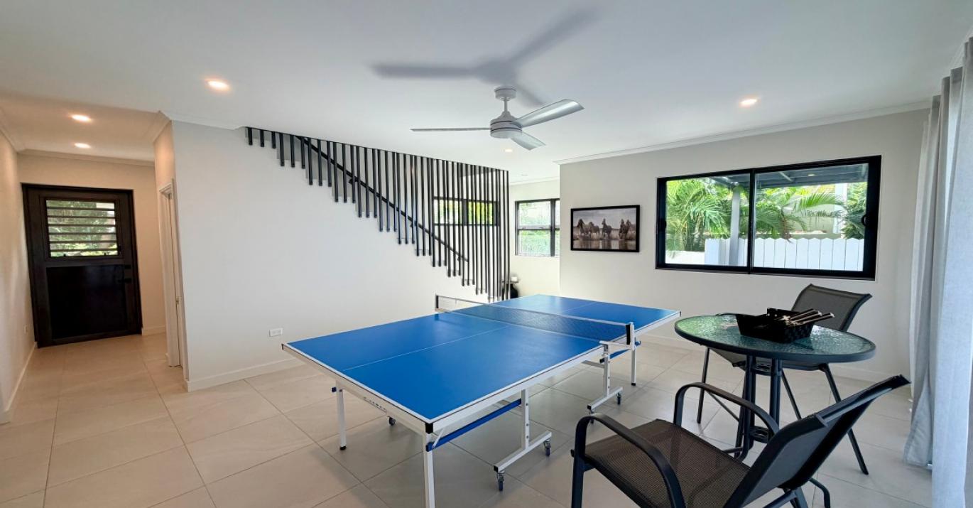 One Shermans games area with laundry