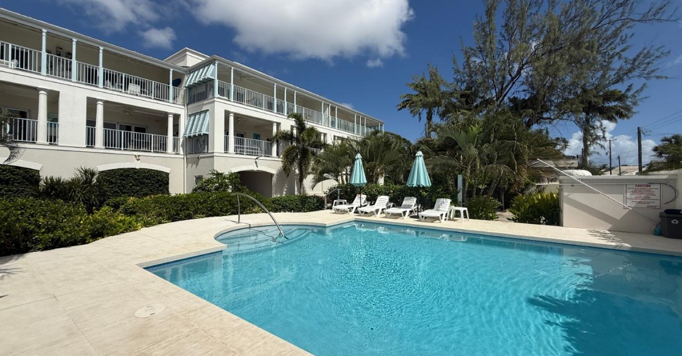 Lighthouse Bay 104 beachfront condo apartment for sale south coast Barbados